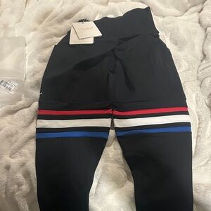 Bombshell Sportswear Black Leggings with Tricolor Stripes